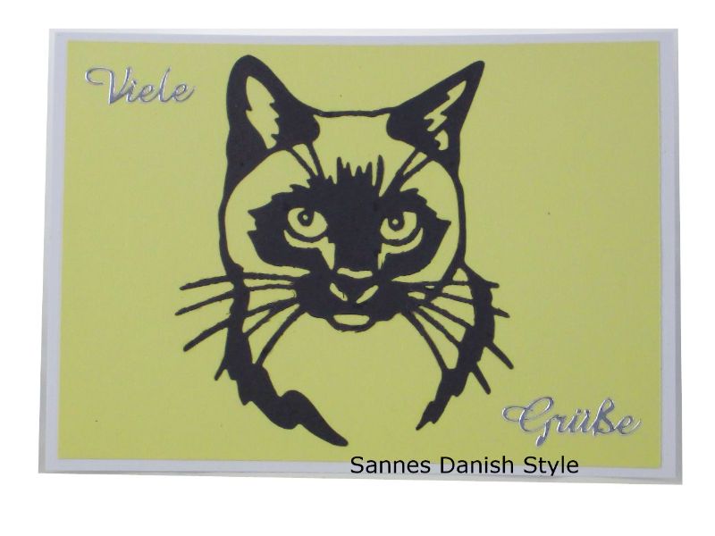  - Postkarte, Postkarte mit Katzenmotiv, Katzenkopf, dunkelgraue Kopf und gelbe Hintergrund, die Postkarte ist DIN A6 (14,8 x 10,5) Format
