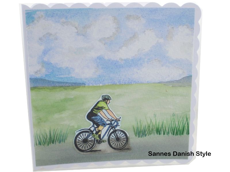  -  3D Geburtstagskarte mit Radfahrer in der Natur, Aquarellkarte mit Himmel und Gras. Die Karte ist  ca. 15 x 15 cm