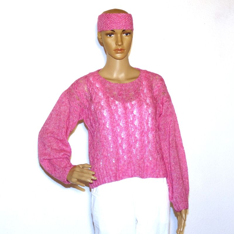 Schicker eleganter Damen-Pullover in einem schönen Ajour-Zopf-Muster in Pink.