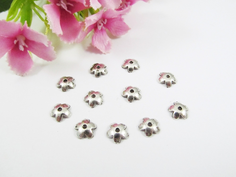  - 100 Perlenkappen 6,5mm, in Blumenform, Farbe silber antik