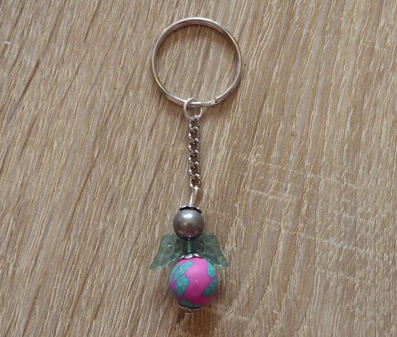  - Handgefertigter Schlüsselanhänger mit Acrylflügeln - Engel  - pink, türkis, grau