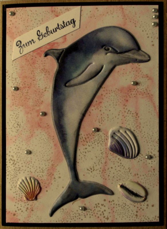 - Niedliche Geburtstagskarte mit einem Delfin und mit Muscheln